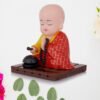 red solar powered sitting buddha statue (1 pc / medium)