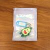 cute avocado cartoon keychain with name tag holder (1 pc) cute avocado cartoon keychain with name tag holder (1 pc)