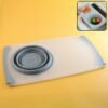2 in 1 over sink cutting board with built in collapsible strainer (50 x 28 cm)