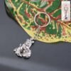 premium silver finish metal bal krishna eating makhan keychain (1 pc)