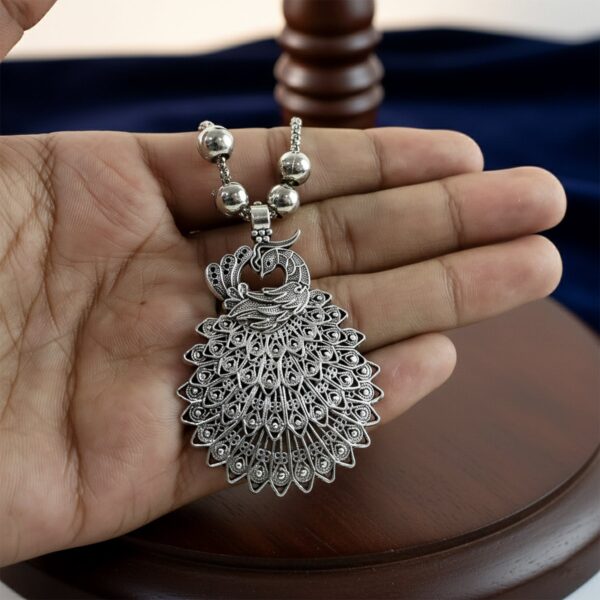 elegant peacock design oxidised silver finish pendant necklace (1 pc) elegant peacock design oxidised silver finish pendant necklace (1 pc)