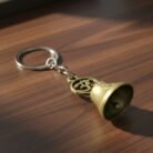 OmSymbolTempleBellMetalKeychain-05_3397f1c9-002c-408d-9772-cd7dde63ec81.jpg